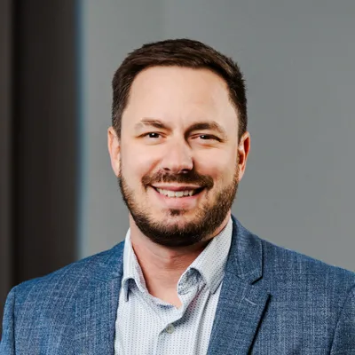 A headshot of Dr. Dusty Large, a chiropractor at Larger Than Life Chiropractic.